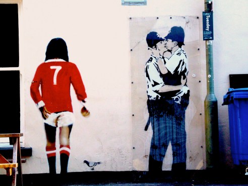 Banksy's kissing policemen on the side of the Albert pub in Brighton, England. Pic Russell Honeyman