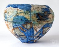 coiled ceramic pot ,glazes poured on ,fired at high temperature stone wear.